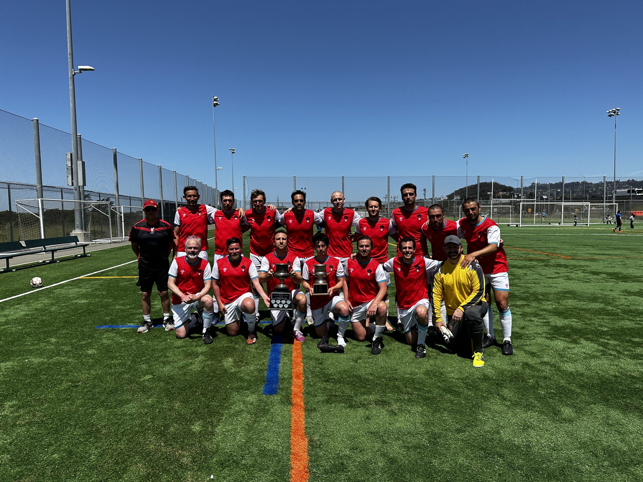 The Rovers posing with their league and cup trophies